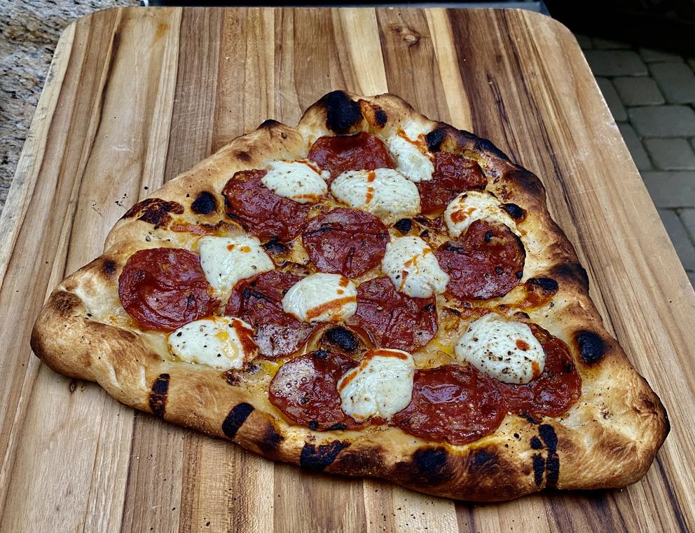 Charred pizza off the stone