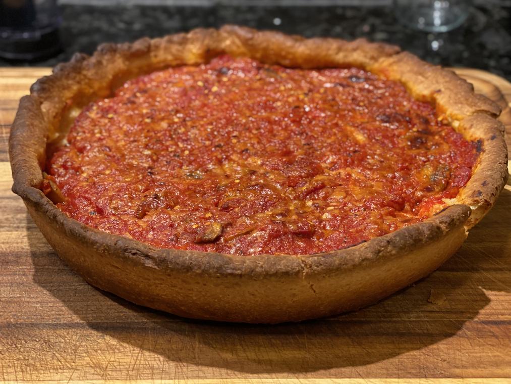 Deep-dish pizza in the pan