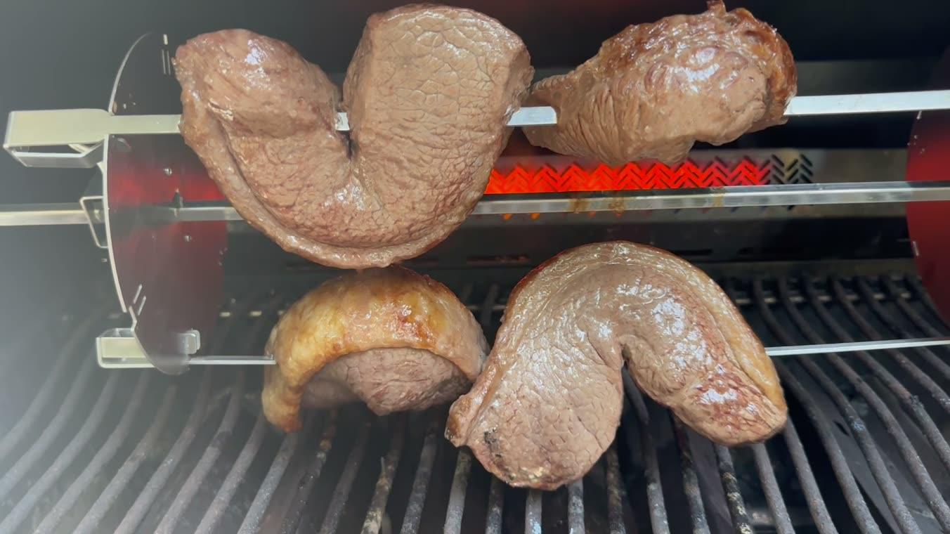 Picanha turning on the rotisserie over the infrared burner